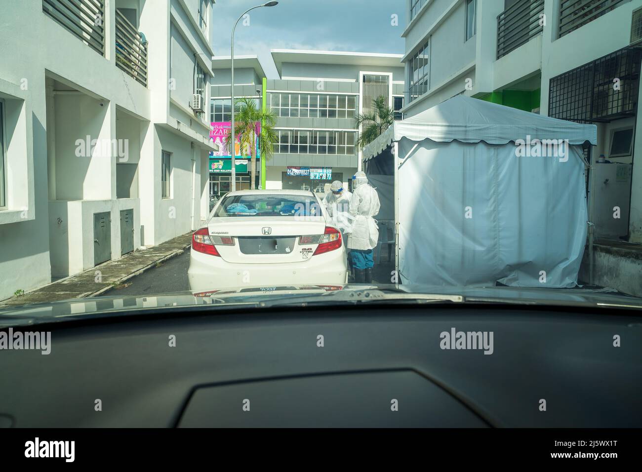 Bangi, Malaysia Feb 15, 2022 Healthcare workers performing the drive