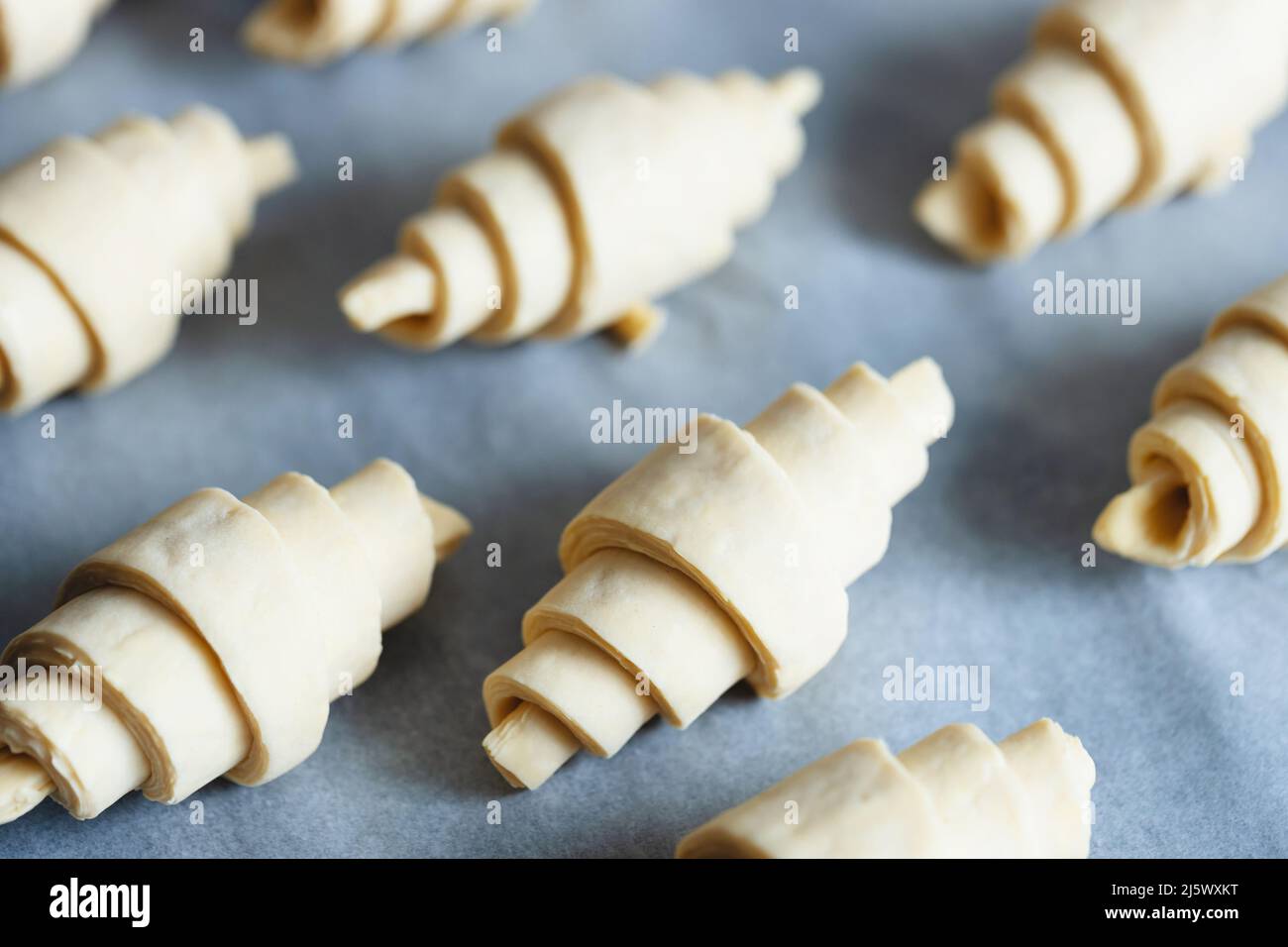 Croissant proof straight before baking. Stock Photo