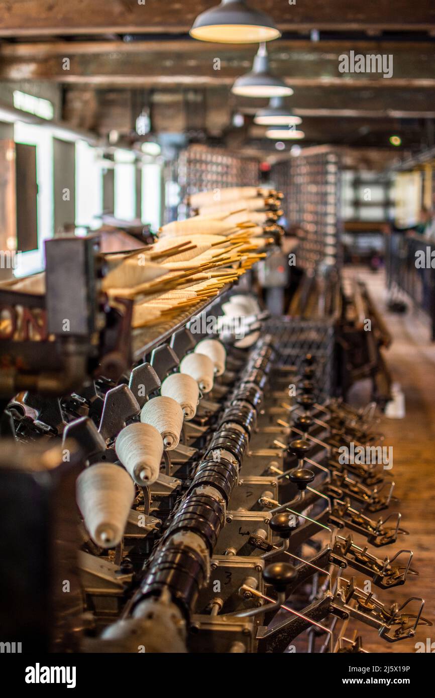 Machines in an old cotton mill. Stock Photo