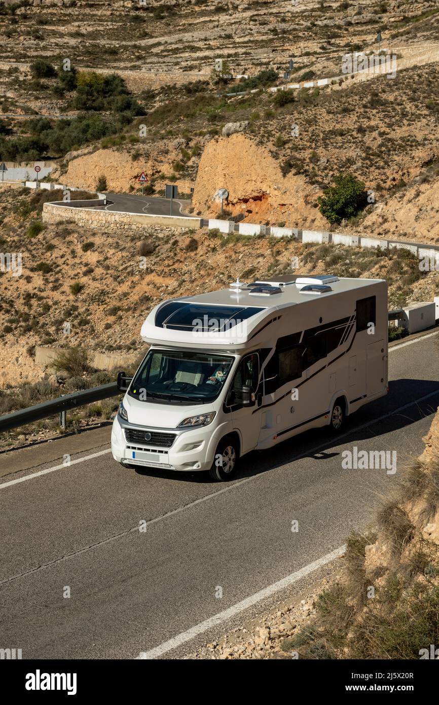 Mobile home on the road, Alcala de Jucar, Spain Stock Photo