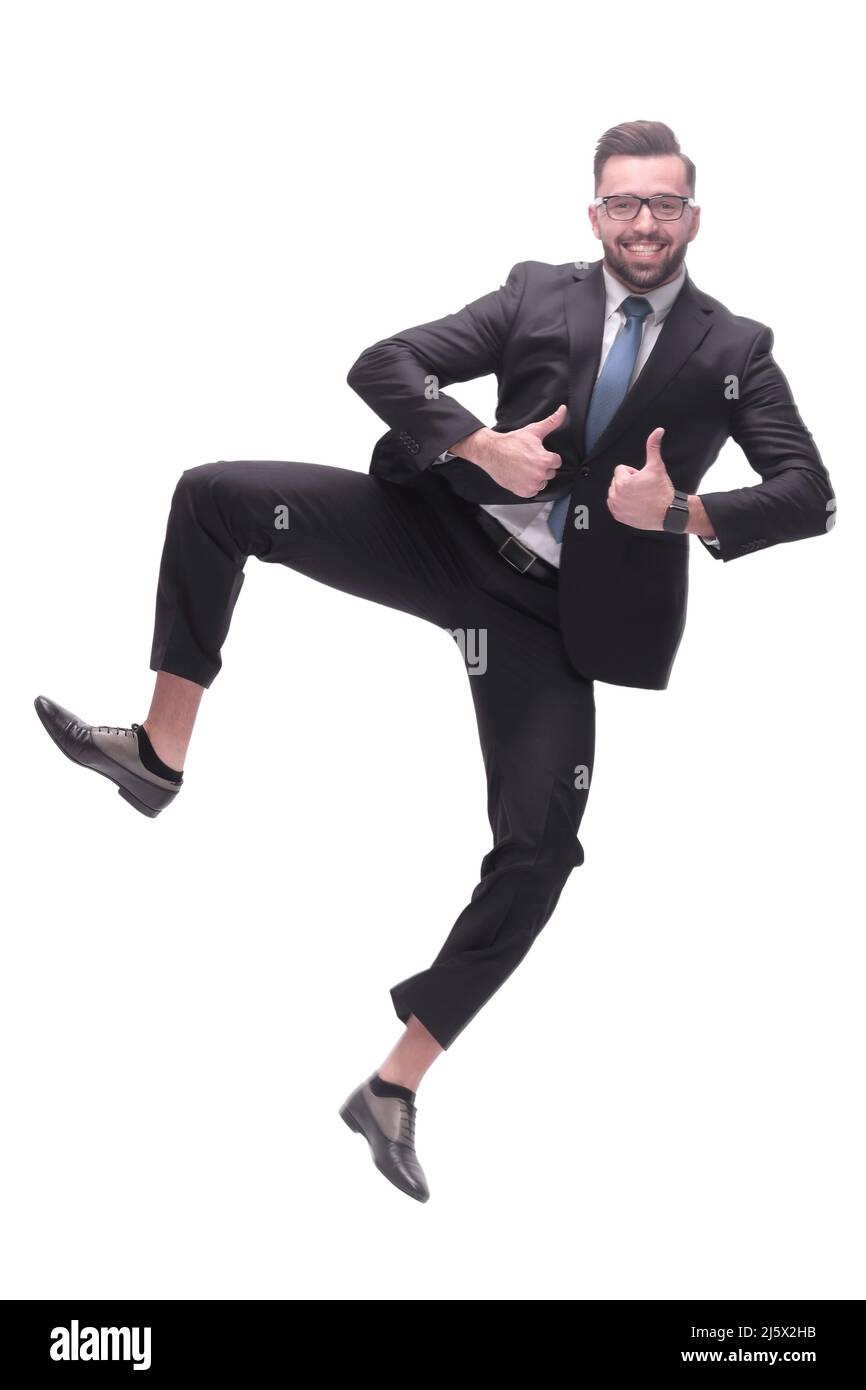 in full growth. happy dancing young businessman Stock Photo