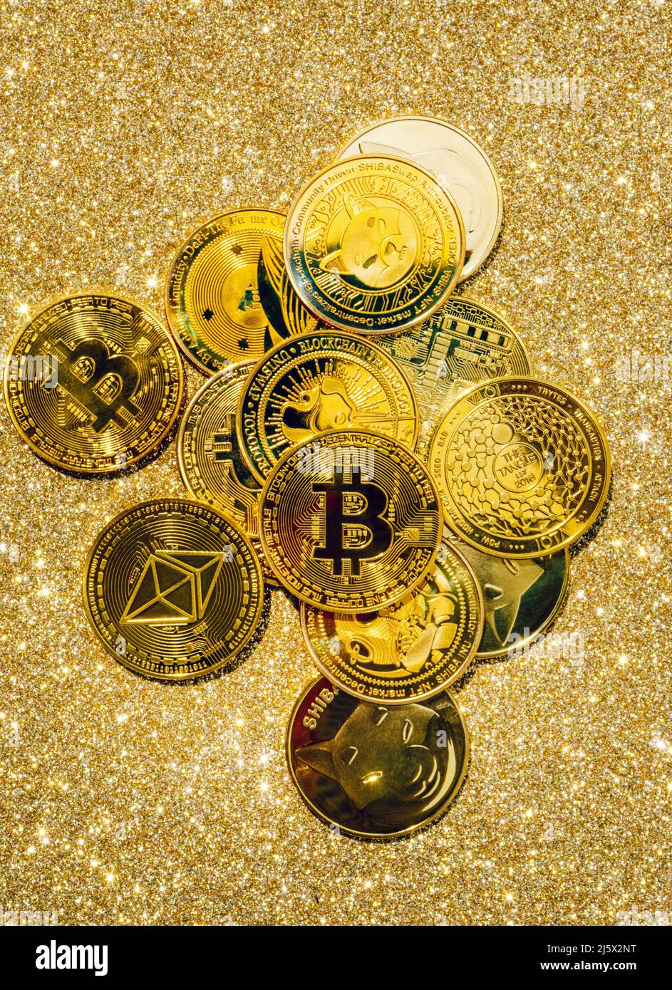 Golden crypto coins on a gold background. Bitcoin cryptocurrency with  altcoins and shitcoins. High quality photo Stock Photo - Alamy