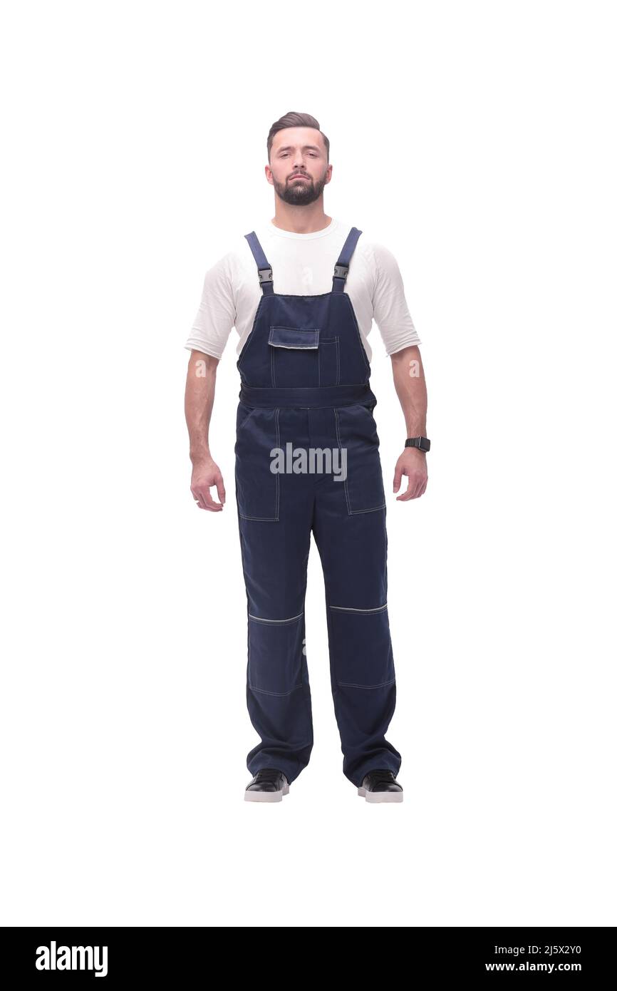 confident young man in blue overalls . isolated on white Stock Photo Alamy