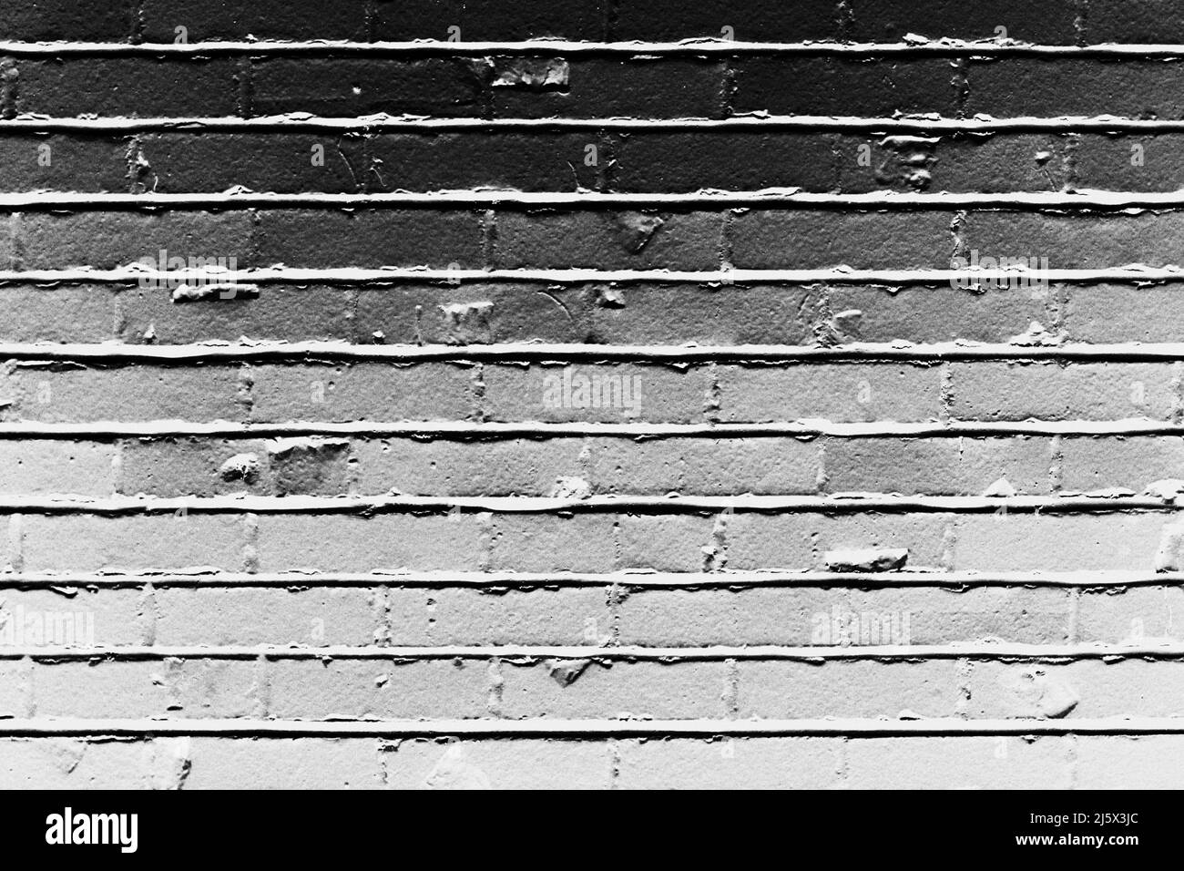 Vintage common brick wall in black and white negative Stock Photo - Alamy