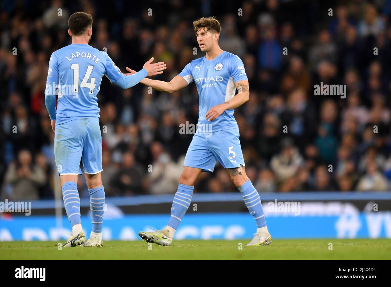Manchester City's Aymeric Laporte and Manchester City's John Stones. Picture date: Thursday April 21, 2022. Photo credit should read:   Anthony Devlin/Alamy Live News/Alamy Live News Stock Photo
