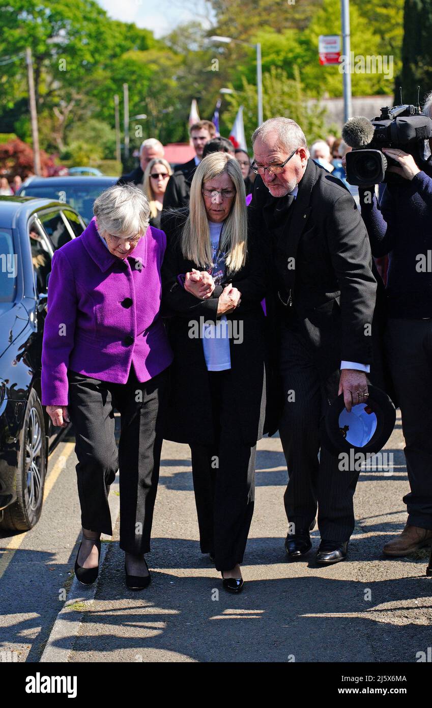 Sheila (front left) arrives for the funeral service of her husband, 96-year-old World War II serviceman and Royal British Legion fundraiser Harry Billinge, at St Paul's Church in Charlestown, Cornwall. Harry was just 18 when he was one of the first British soldiers to land on Gold Beach during the Battle for Normandy and was one of only four survivors from his unit. Picture date: Tuesday April 26, 2022. Stock Photo