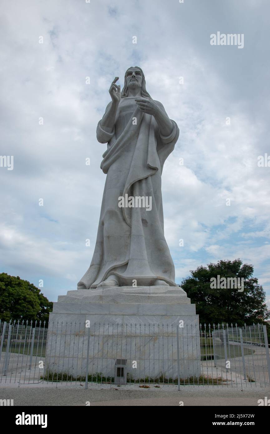 The Christ of Havana (Cristo de La Habana) is a large sculpture representing Jesus of Nazareth, on a hilltop overlooking the bay in Havana, Cuba. It i Stock Photo