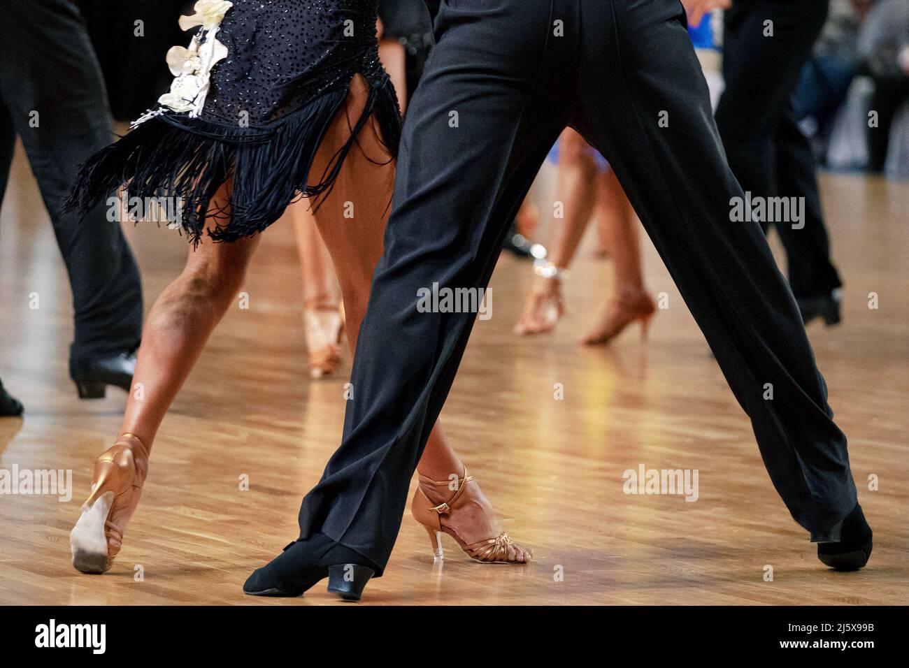 legs male and female dancers in dance competition Stock Photo