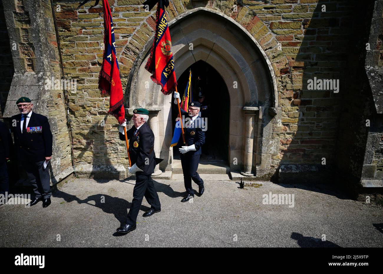 Standard-bearers at the funeral service for 96-year-old World War II serviceman and Royal British Legion fundraiser Harry Billinge, at St Paul's Church in Charlestown, Cornwall. Harry was just 18 when he was one of the first British soldiers to land on Gold Beach during the Battle for Normandy and was one of only four survivors from his unit. Picture date: Tuesday April 26, 2022. Stock Photo