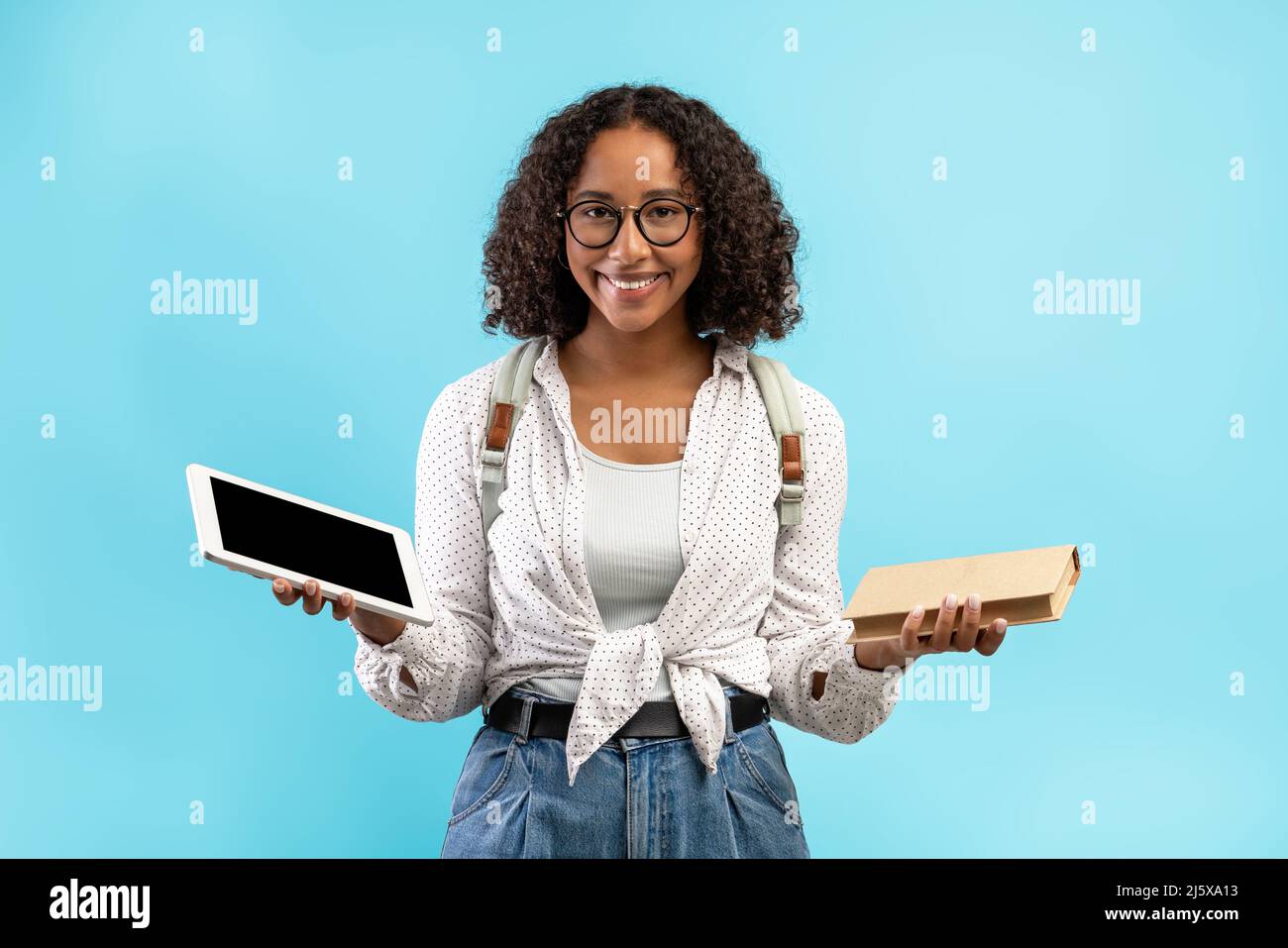 Online education vs offline studies. Black female student with backpack ...