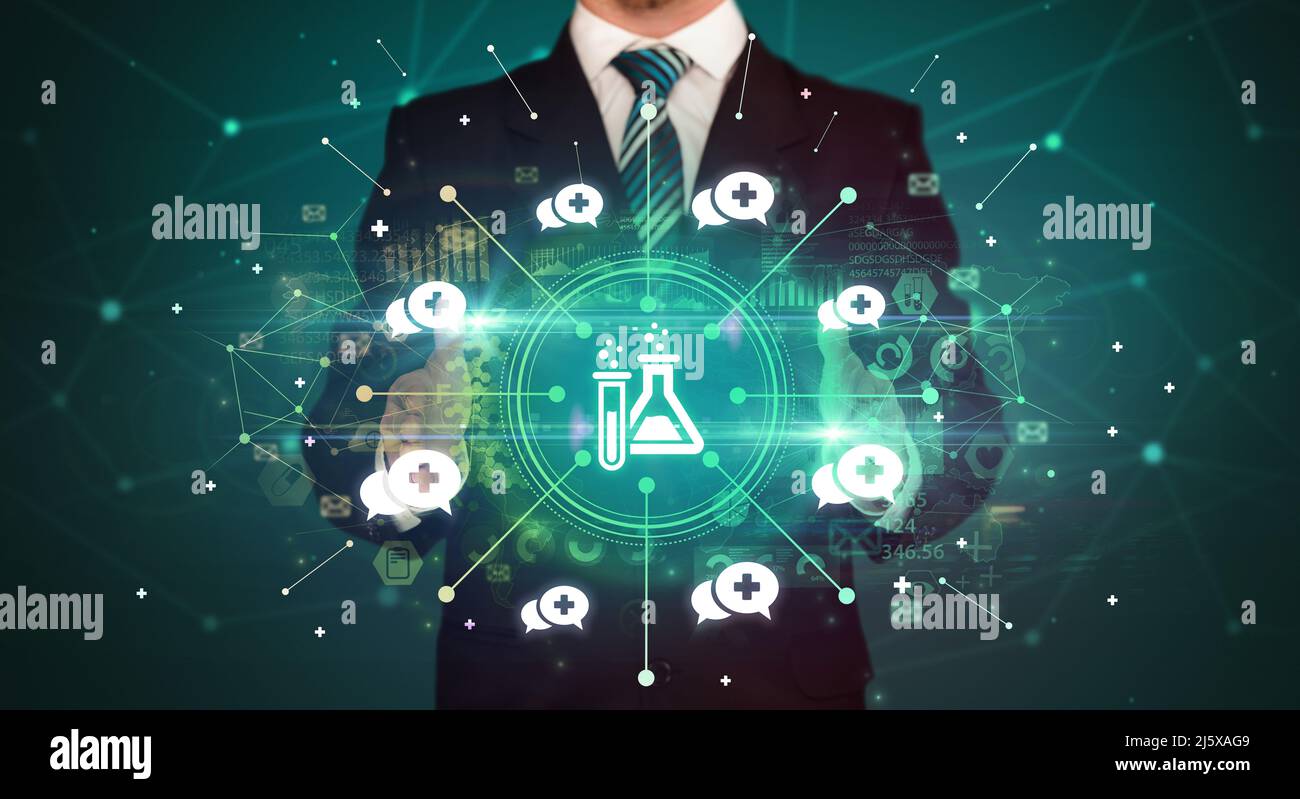 Hand holding healthcare icons concept Stock Photo - Alamy