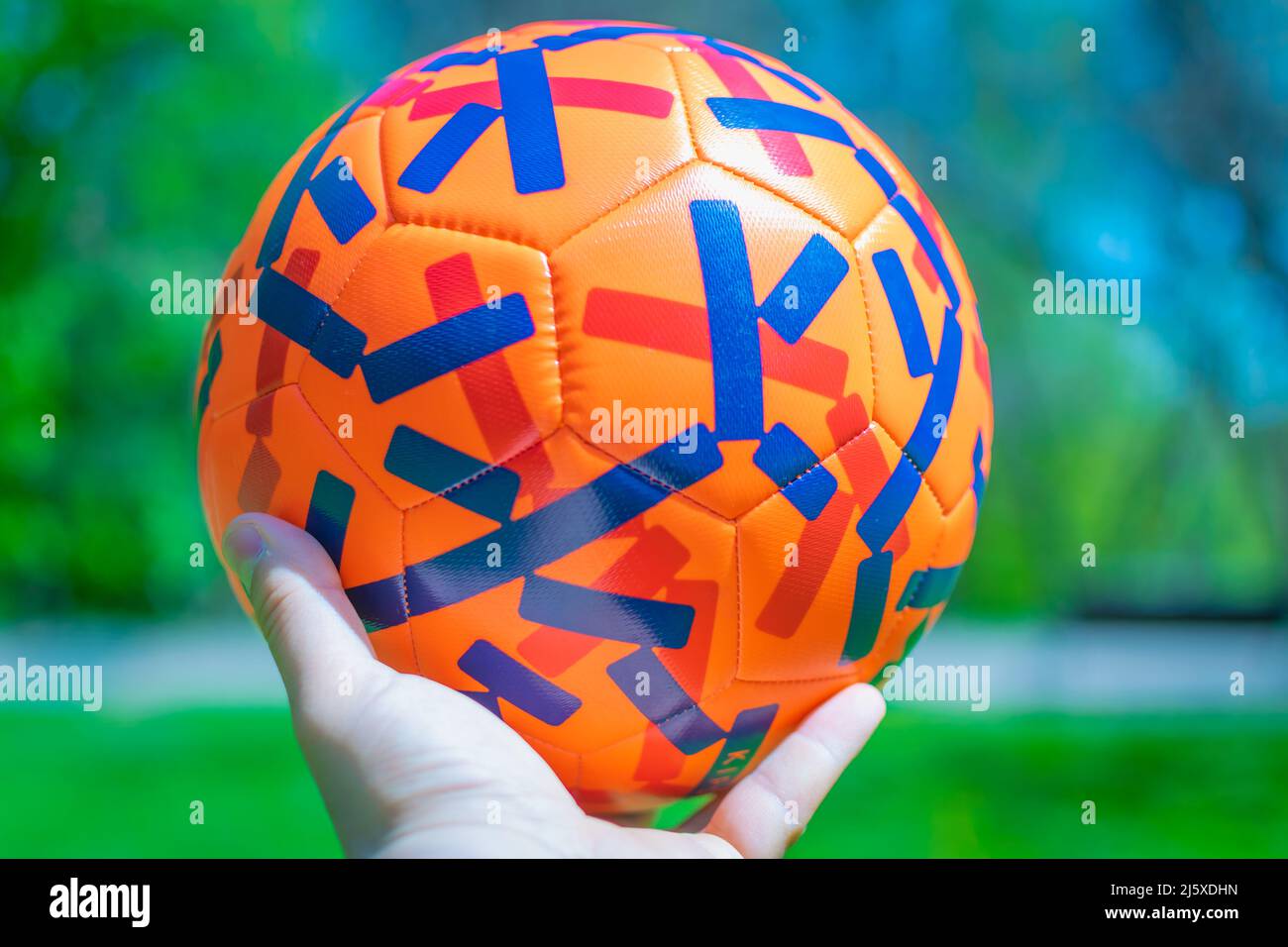 Colorful Football on grass Qatar World Cup 2022 Concept close-up Stock Photo