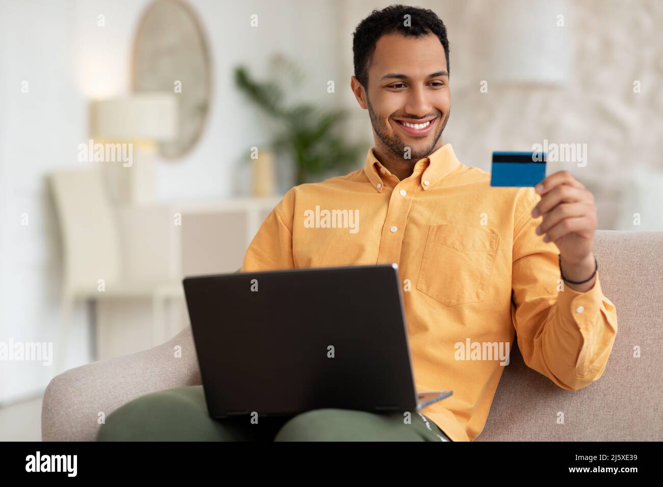 Indian bearded man using credit hi-res stock photography and images - Alamy