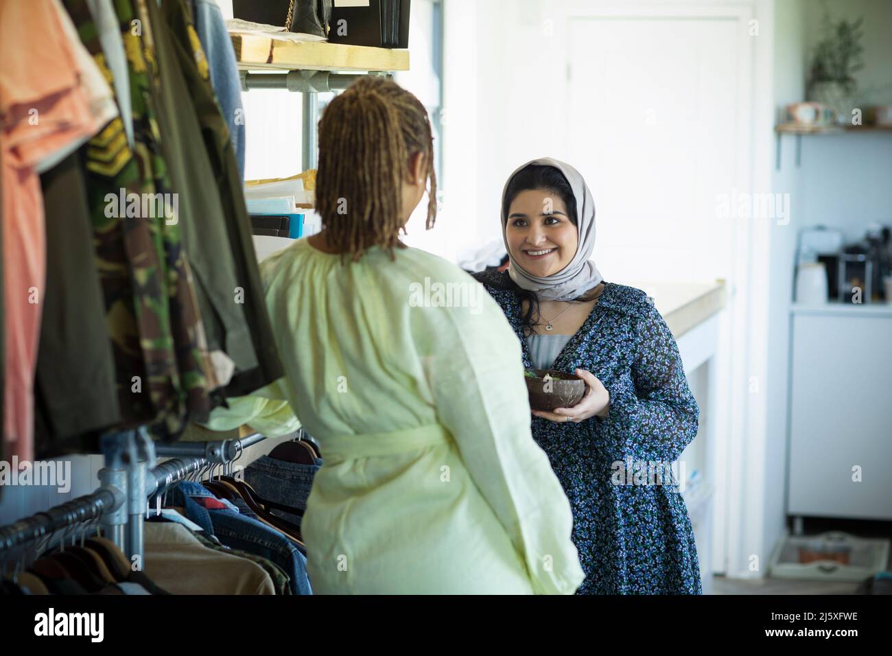 Young women friends talking Stock Photo