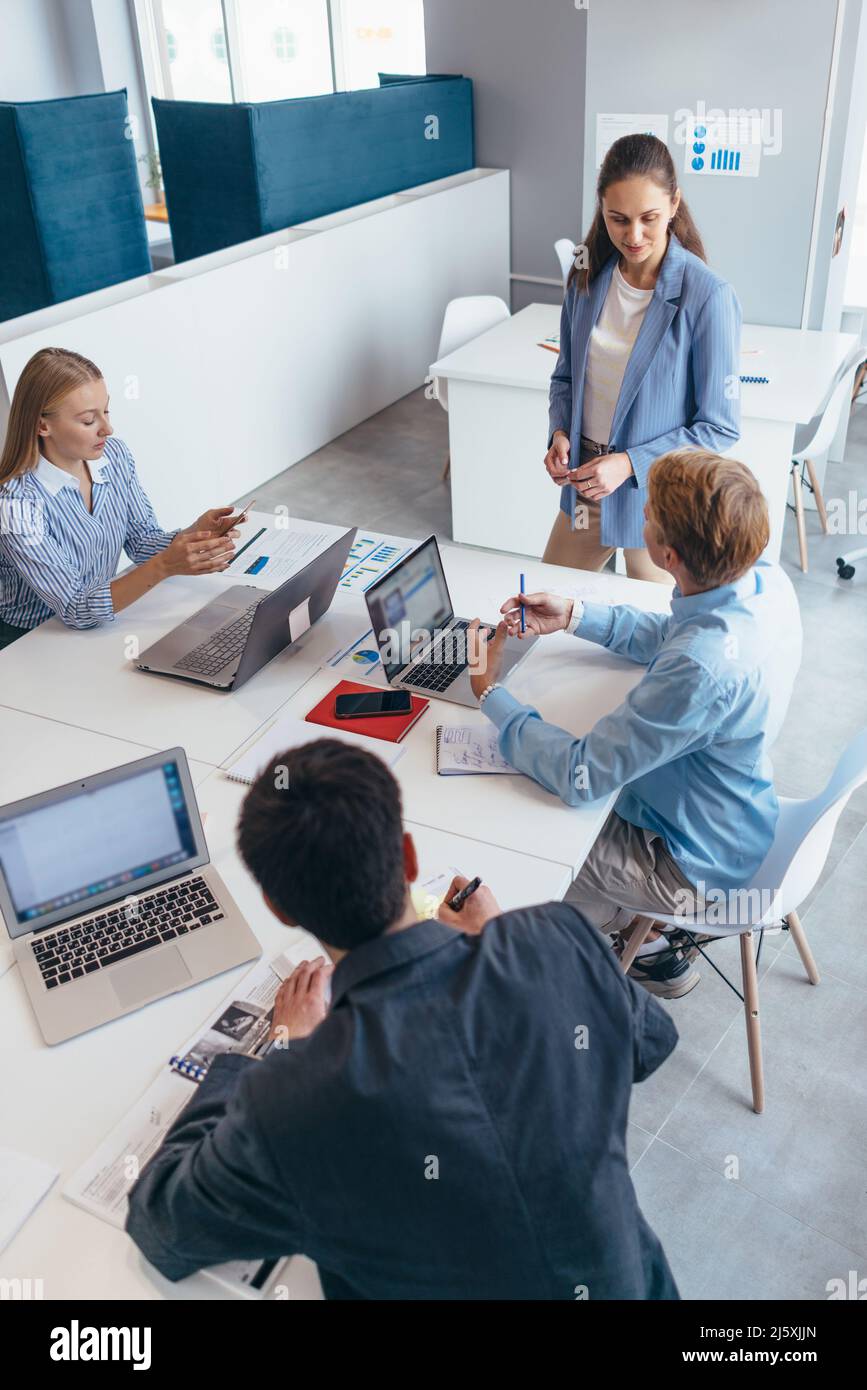 Business people collaborating on a new project Stock Photo - Alamy