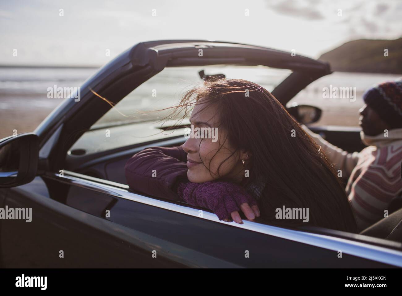 Happy woman in convertible Stock Photo