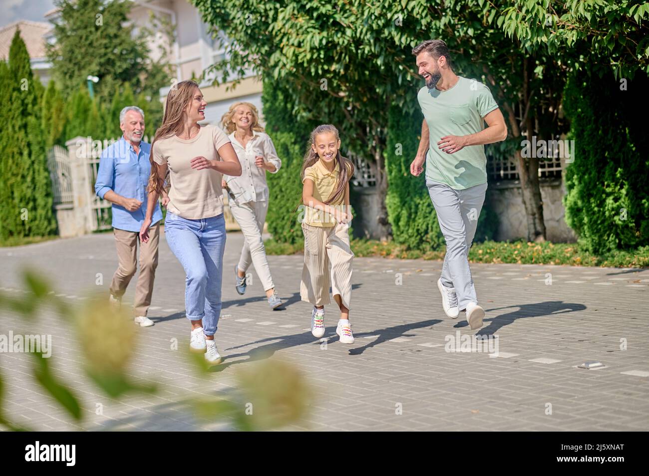 Happy family enjoying rest hi-res stock photography and images - Alamy