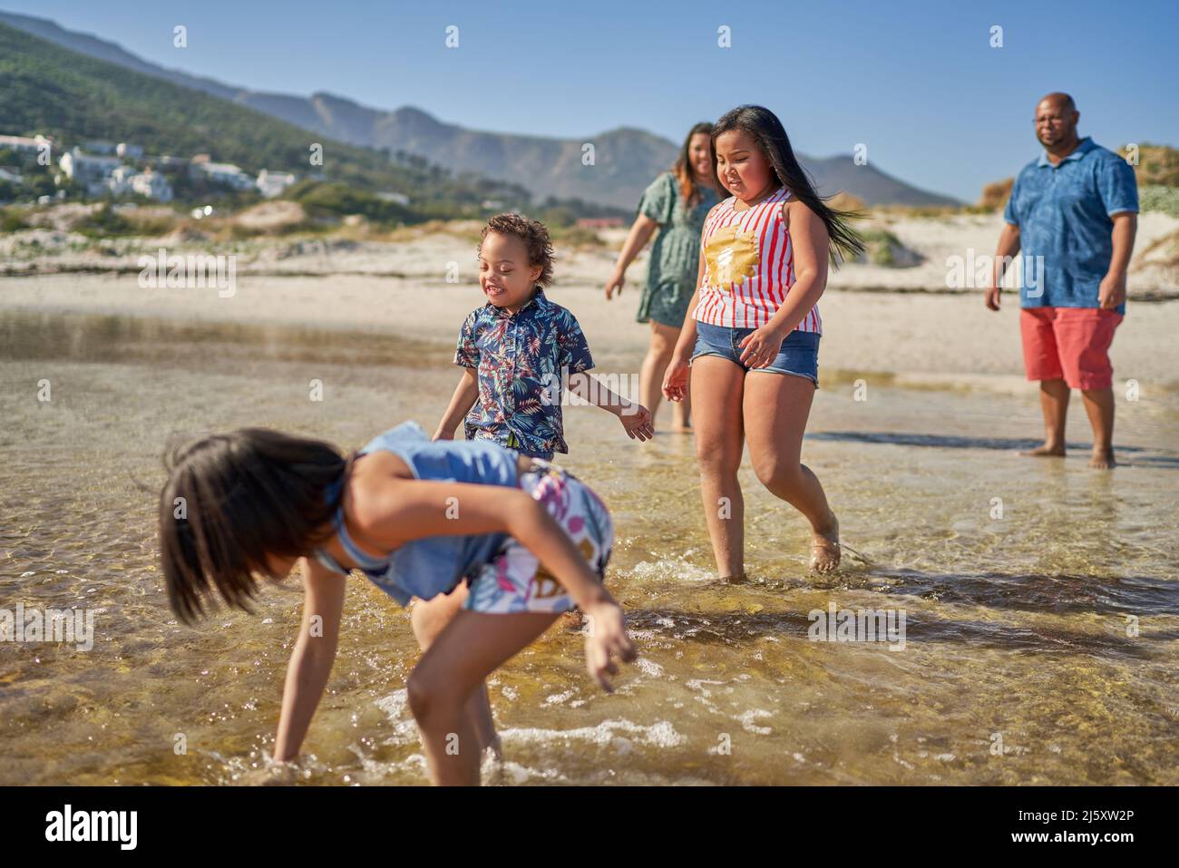 Family beach day in the summer hi-res stock photography and images - Alamy