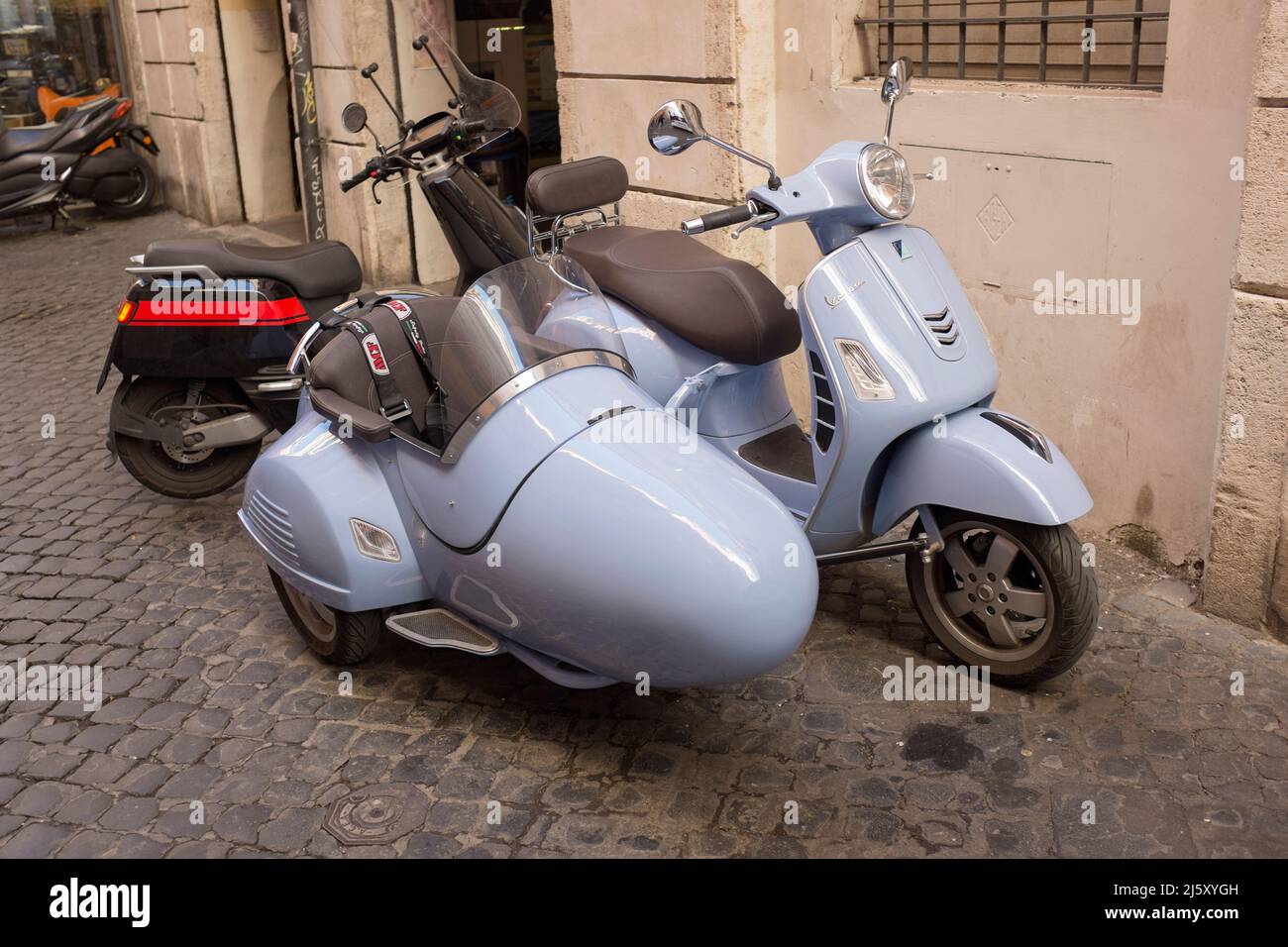 Vespa Scooter with sidecar Rome Italy Stock Photo