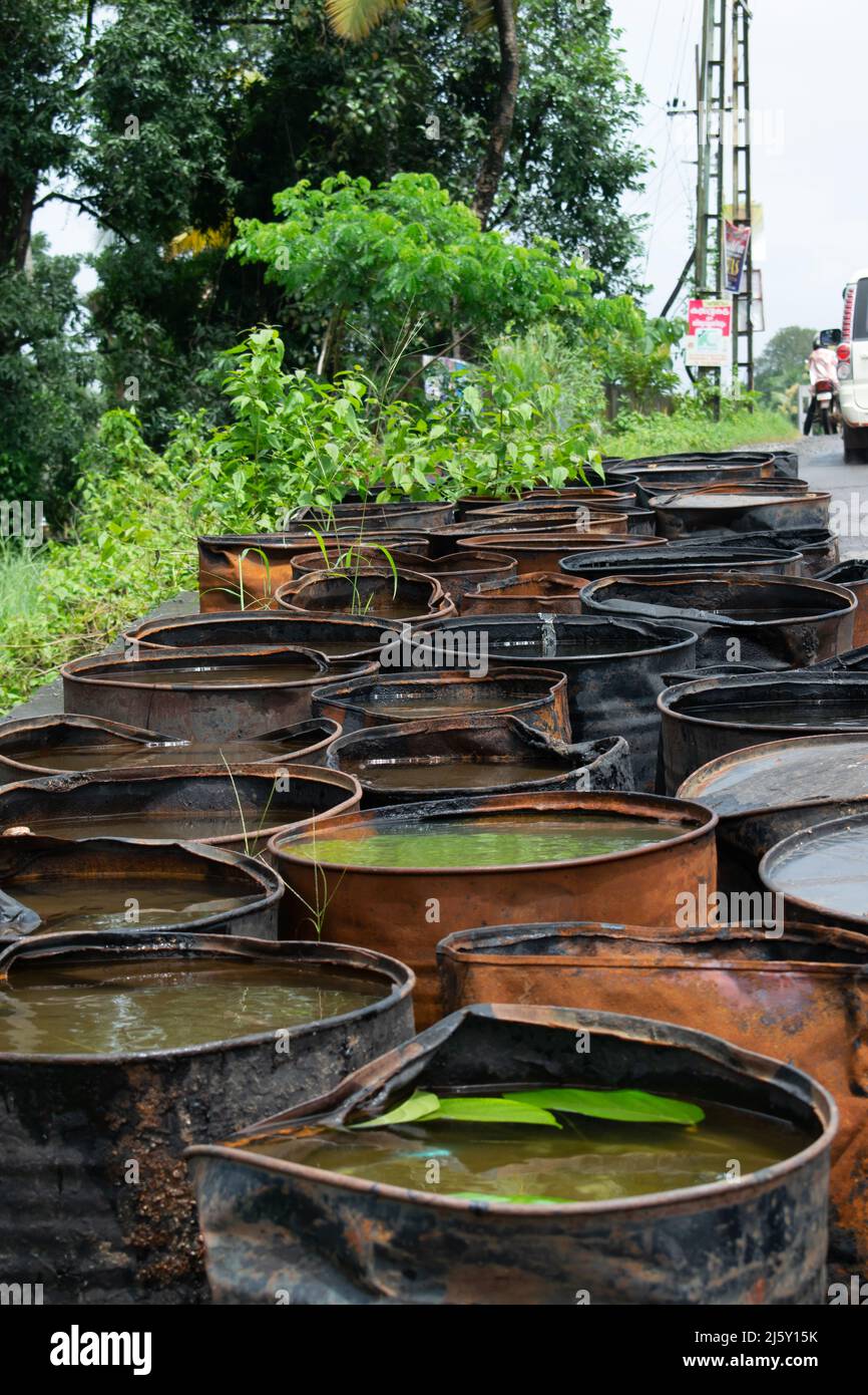 Water is stored in big cans. Concept Water utilization Stock Photo