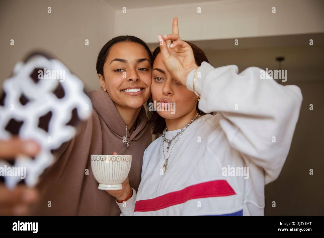 Cool young women posing for selfie Stock Photo
