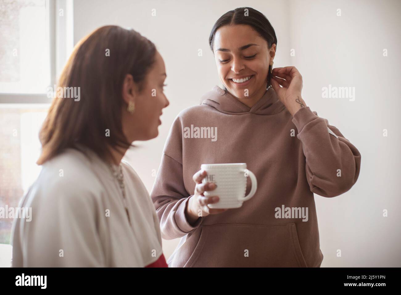 Young women friends drinking tea Stock Photo