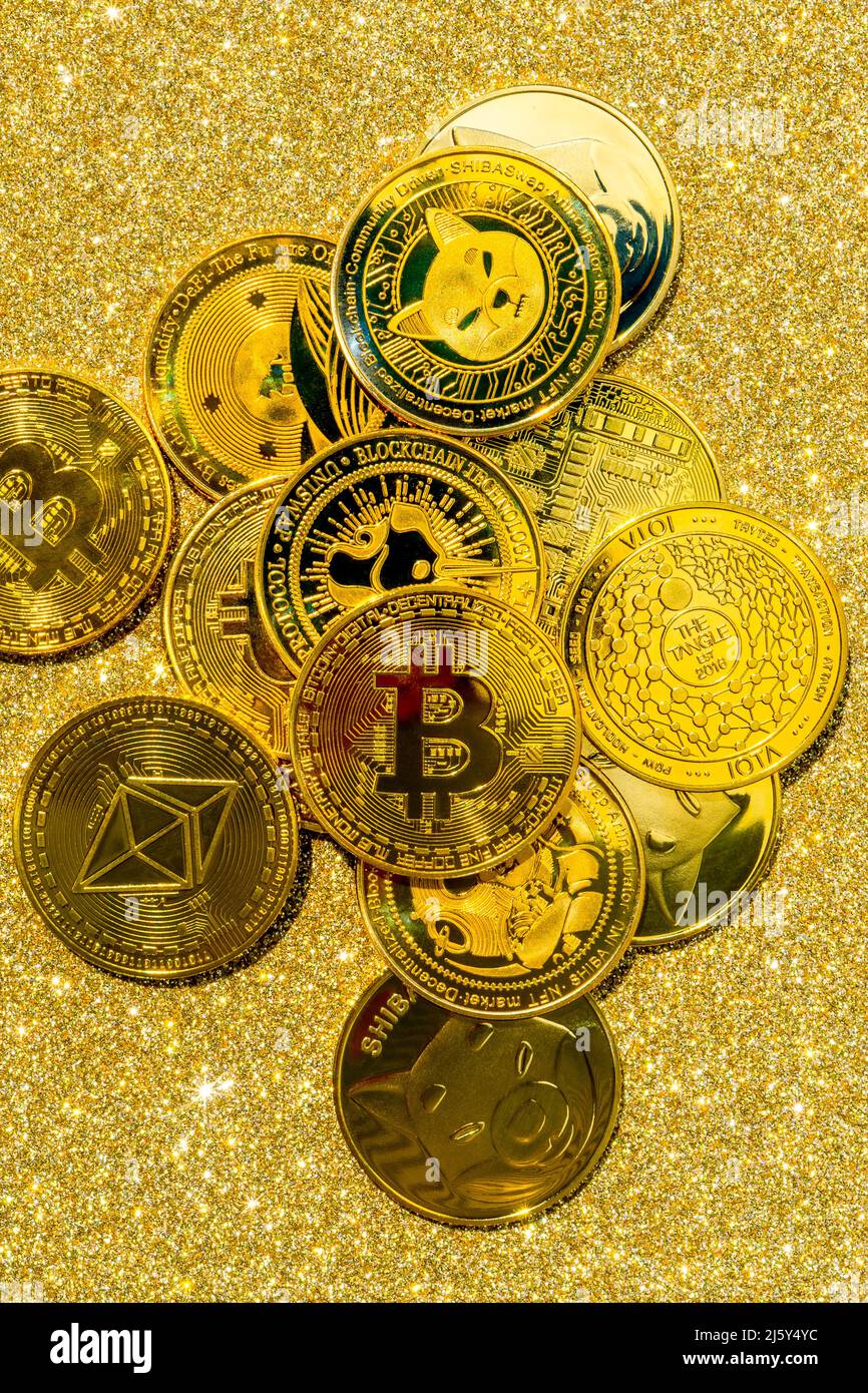 Golden crypto coins on a gold background. Bitcoin cryptocurrency with  altcoins and shitcoins. High quality photo Stock Photo - Alamy
