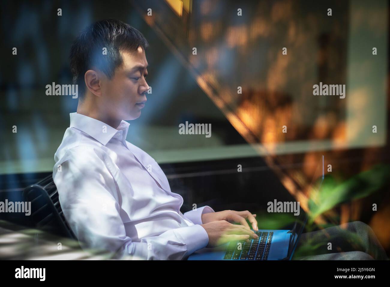 Businessman working at laptop Stock Photo