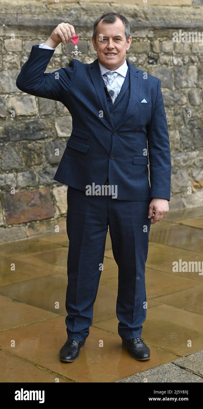 Photo Must Be Credited ©Alpha Press 079965 15/02/2022 John McGuinness receives an MBE for services to Motorcycle Racing during an Investitures Ceremony at Windsor Castle in Windsor, Berkshire. Stock Photo