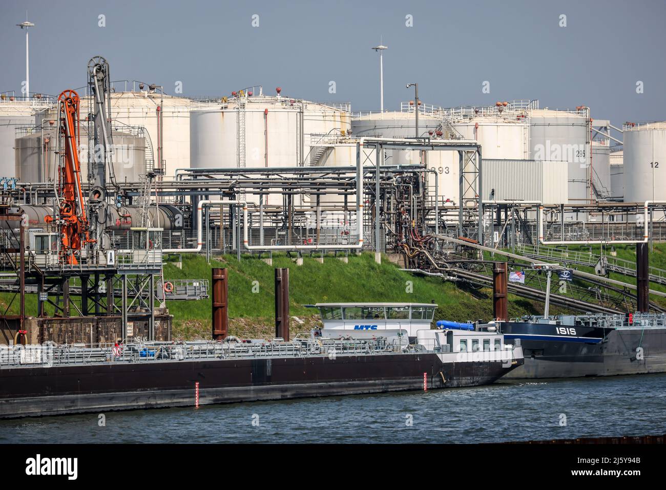 Duisburg, North Rhine-Westphalia, Germany - Duisburg Port, Duisburg Ruhrort, oil island, tankers in front of tank farm for mineral oil products, fuel Stock Photo
