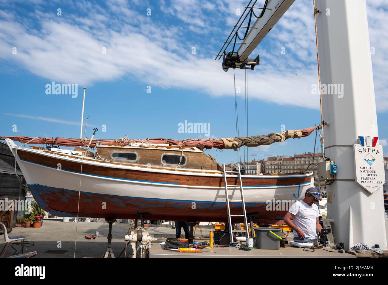 Marseille port - old fisherman boat with pirates flag Stock Photo - Alamy