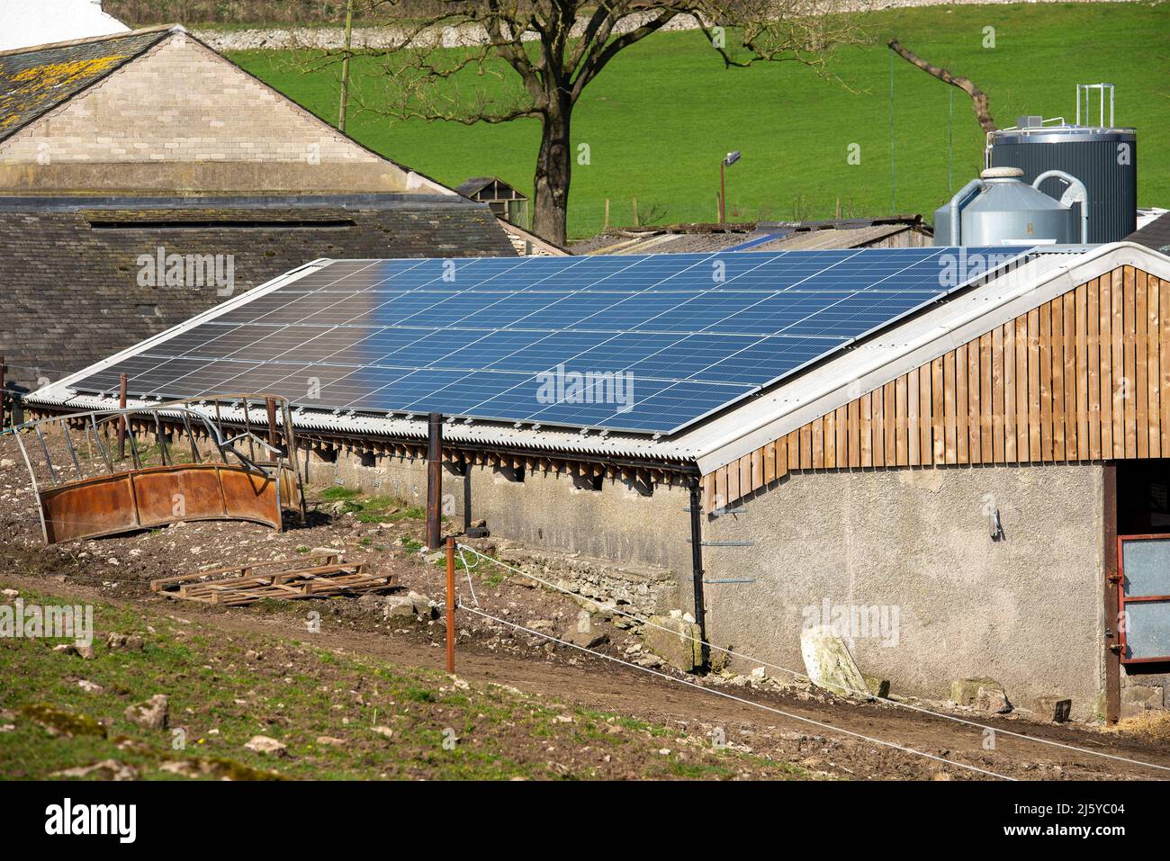 Solar panels on farm buildings, Arnside, Cumbria. Stock Photo