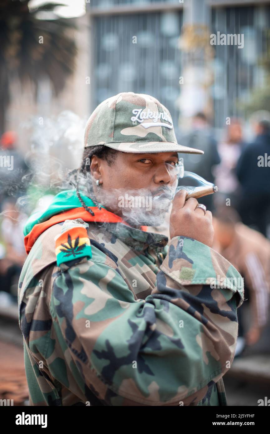 Bogotá, Colombia April 20th, 2022 person smoking a blunt at the 420