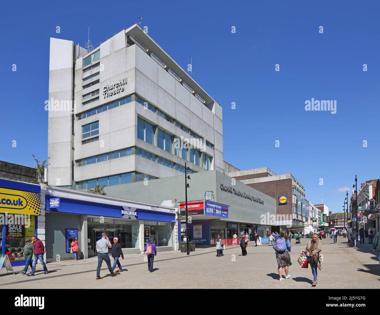 Bromley town centre, busy shopping street. Shows pedestrianised area of the High Street and Churchill Theatre. Stock Photo