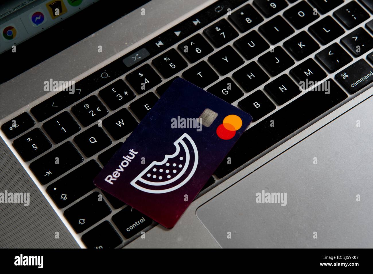 Revolut Credit visa card on computer Keyboard. Digital money, internet banking Stock Photo