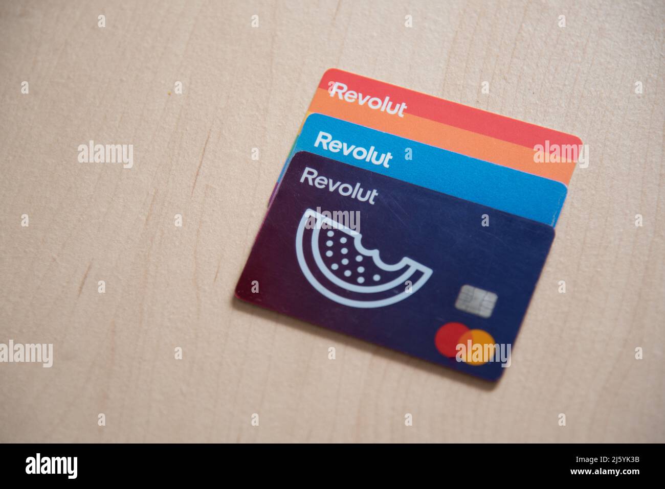 Revolut Credit visa cards on table . Digital money, internet banking Stock Photo