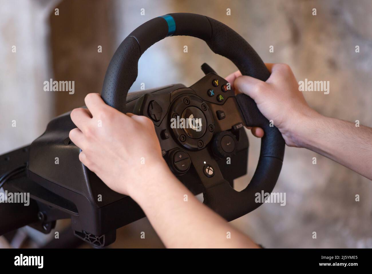 Man hands turning car steering hi-res stock photography and images - Alamy