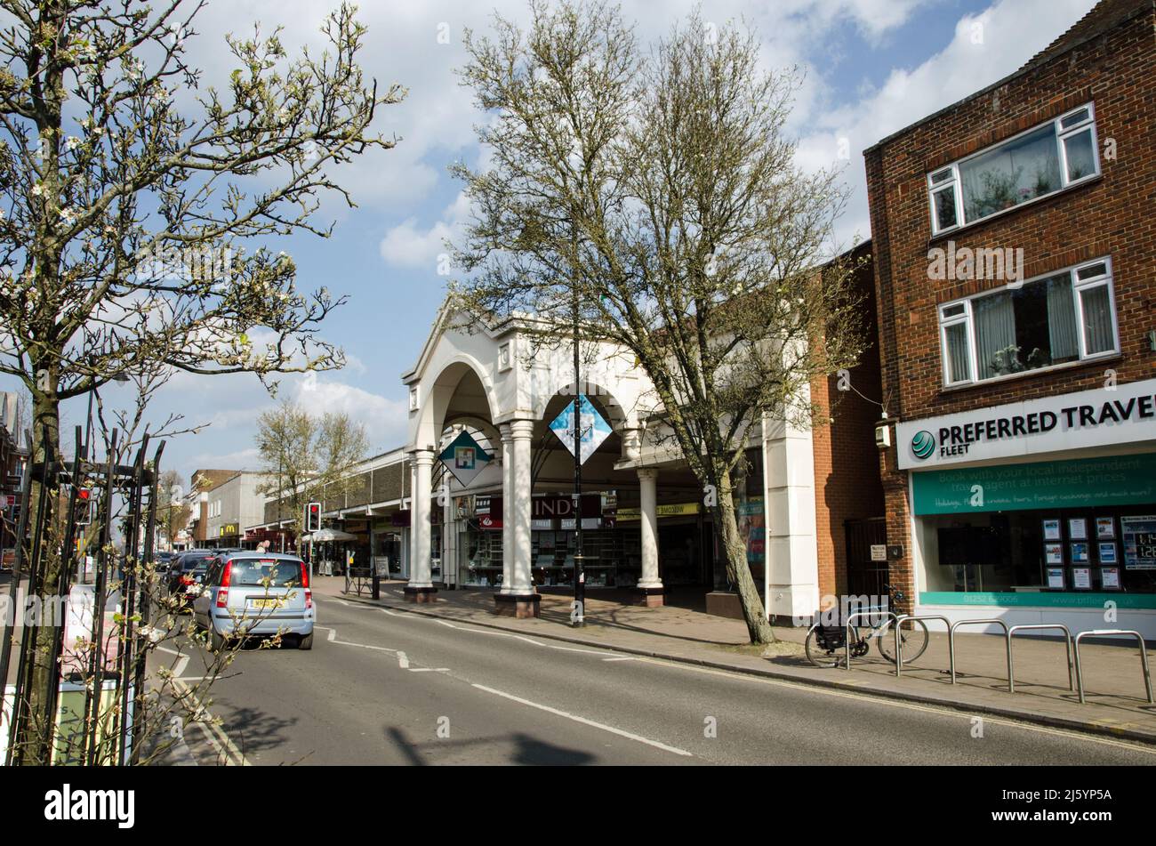 Fleet, UK - March 20, 2022: Fleet Road in the middle of Fleet town centre in the wealthy Hampshire borough of Hart viewed on a sunny Sunday afternoon Stock Photo