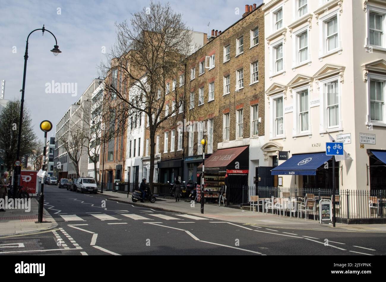London, UK - March 21, 2022: View along the fashionable Charlotte Street in Camden, Central London.  The street is associated with the advertising ind Stock Photo
