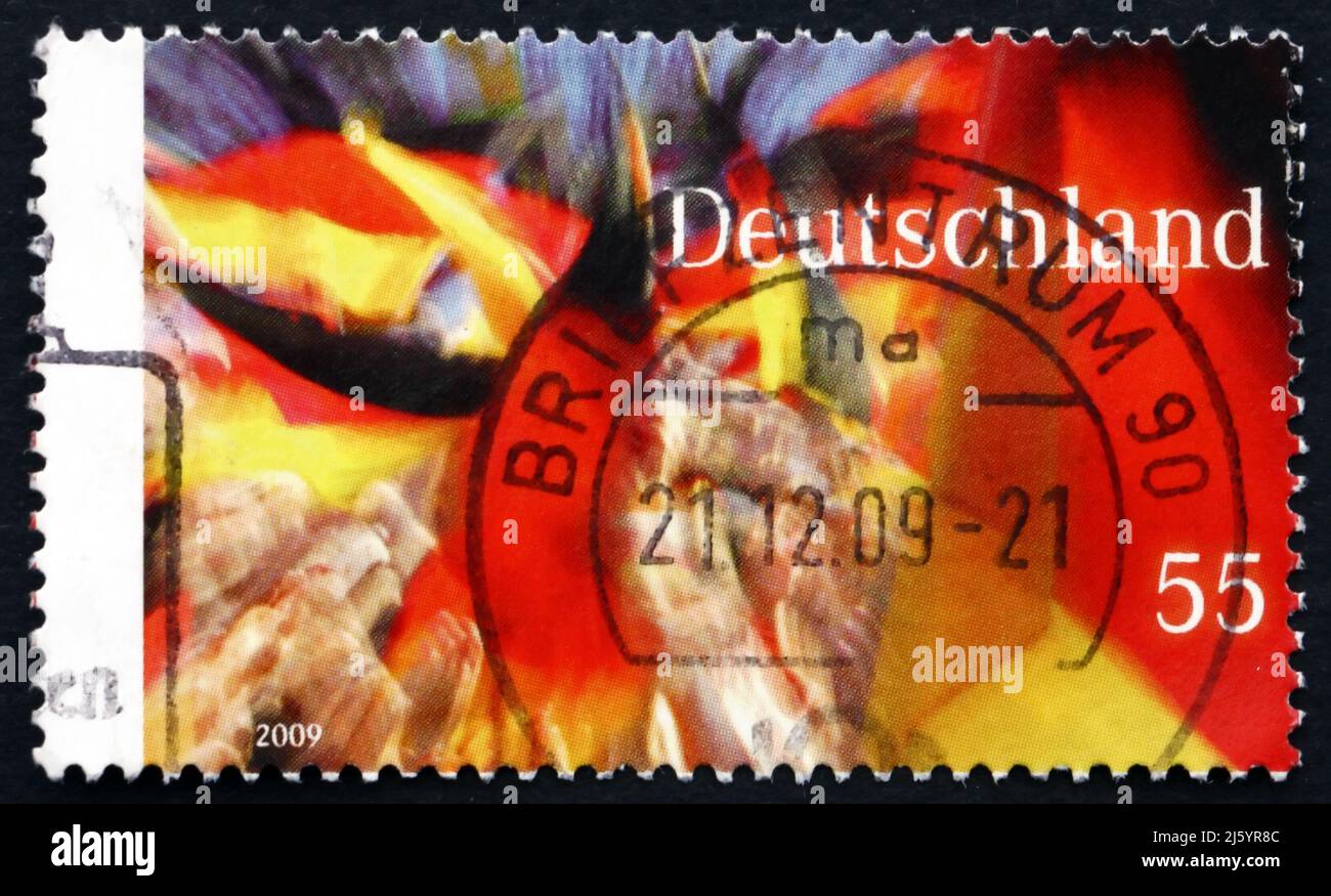 GERMANY - CIRCA 2009: a stamp printed in the Germany shows German Flag, German Federal Republic, 60th Anniversary, circa 2009 Stock Photo