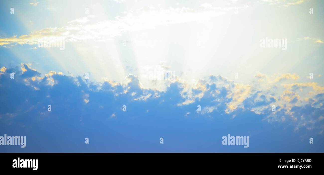 Beautiful dramatic sky with sun rays and clouds. Background for ...