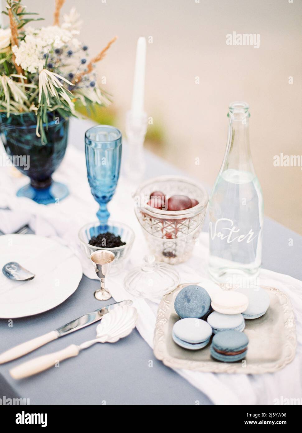 Wedding dinner at the beach. Catering table setting Stock Photo
