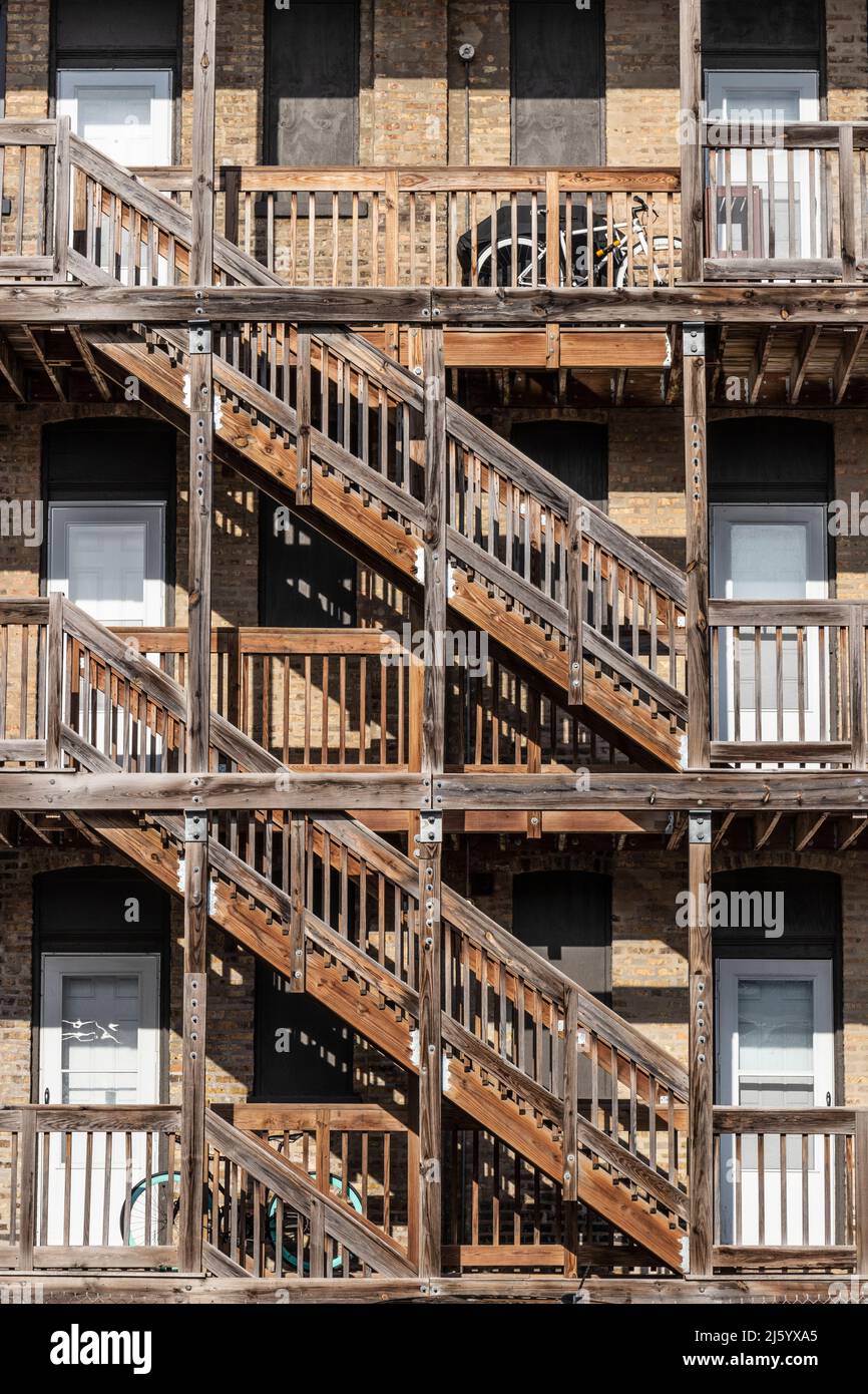 Urban apartment multiunit dwelling with sidebyside units stacked on