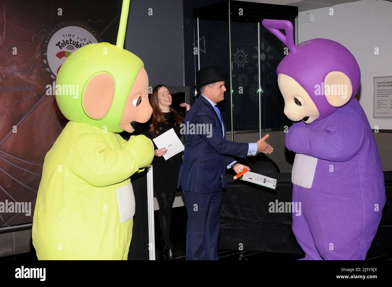 New York, United States. 26th Apr, 2022. The Teletubbies visit the Empire State Building to celebrate their 25th Anniversary in New York City. During their visit a contract was signed with Lloyd's of London for 5 million dollars each. (Photo by Efren Landaos/SOPA Images/Sipa USA) Credit: Sipa USA/Alamy Live News Stock Photo