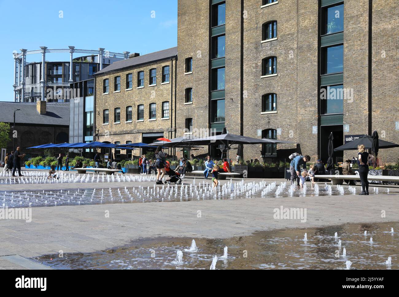 The fountains on Granary Square in spring sunshine, at Kings Cross