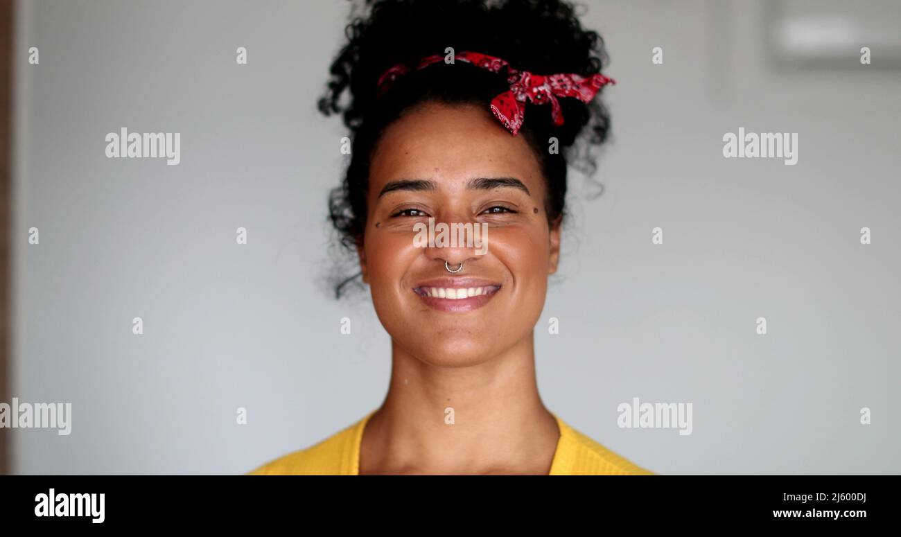 African Amercian woman authentic smile. Black girl real life laugh Stock Photo