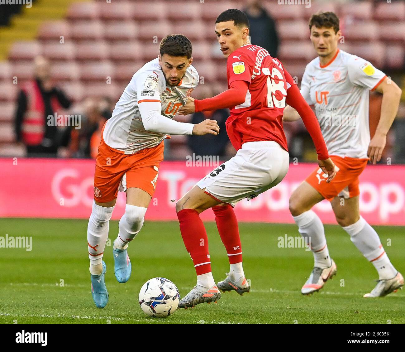 Owen Dale #7 of Blackpool breaks past Isaac Christie-Davies #18 of Barnsley in, on 4/26/2022. (Photo by Craig Thomas/News Images/Sipa USA) Credit: Sipa USA/Alamy Live News Stock Photo