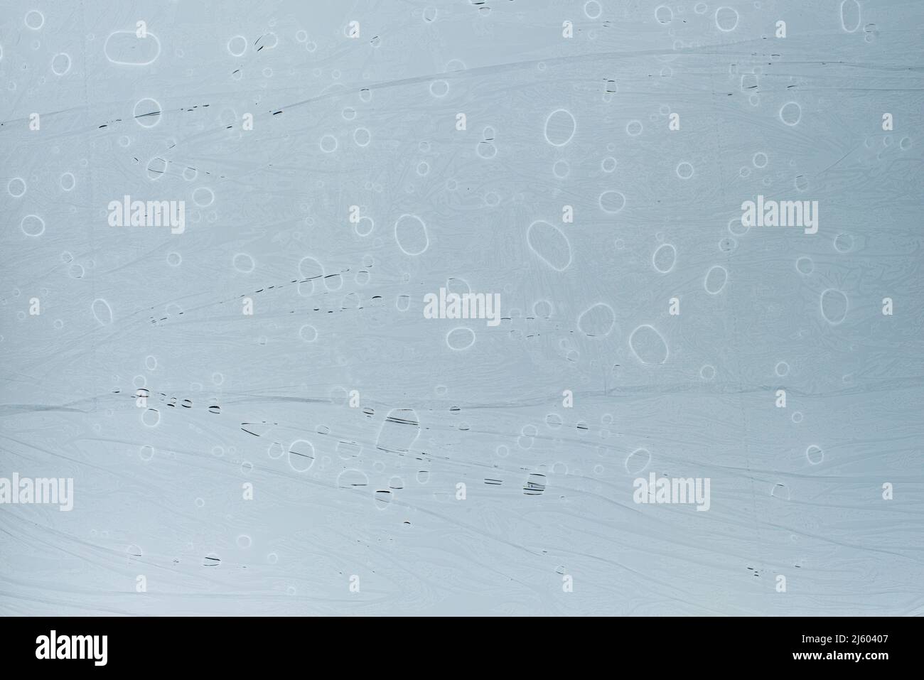 Abstract background with water drops. White circles on blue background. Stock Photo