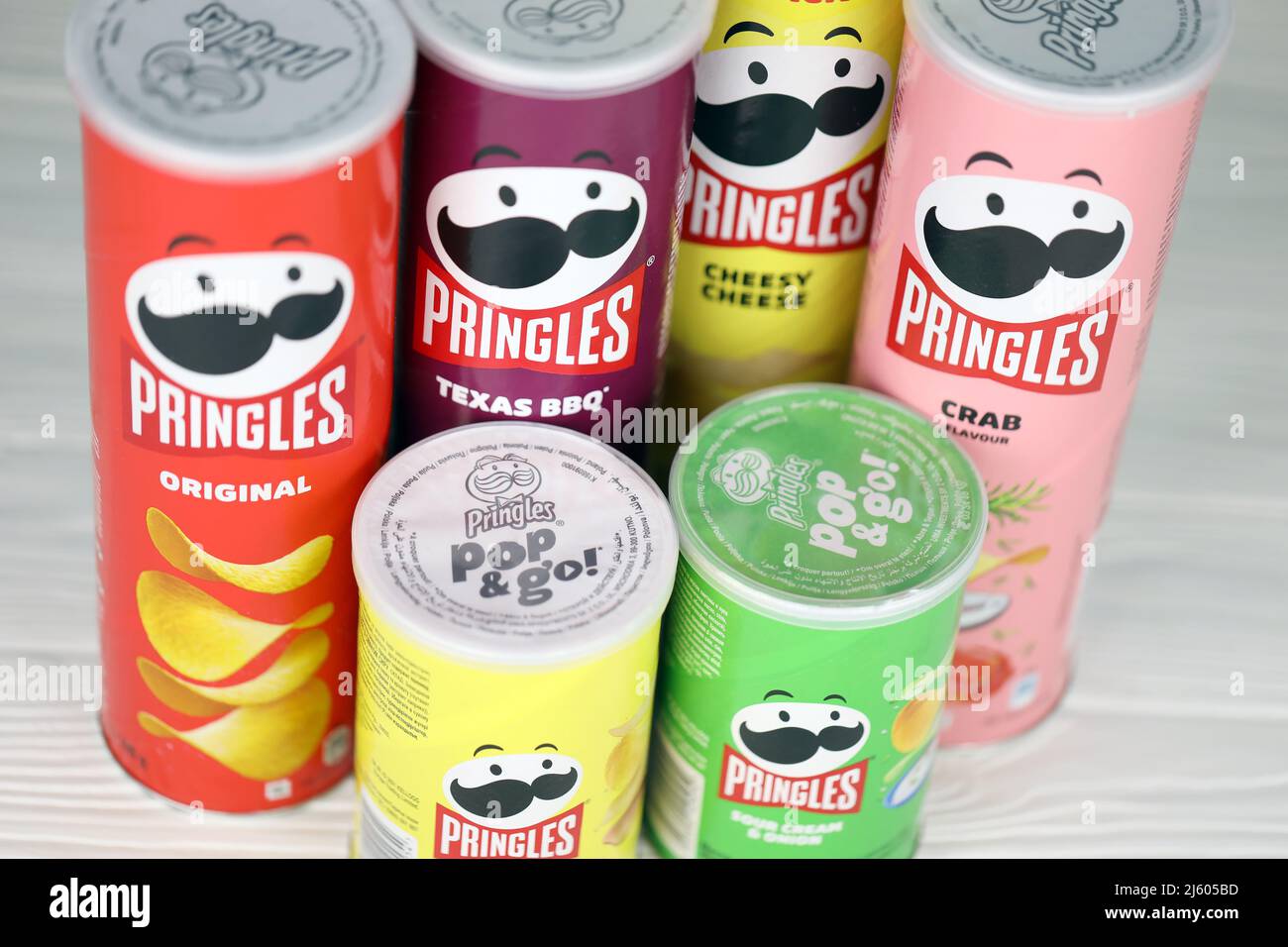 KHARKIV, UKRAINE - DECEMBER 16, 2021: Pringles production with new logo. Pringles is a brand of potato snack chips owned by the Kellogg Company Stock Photo