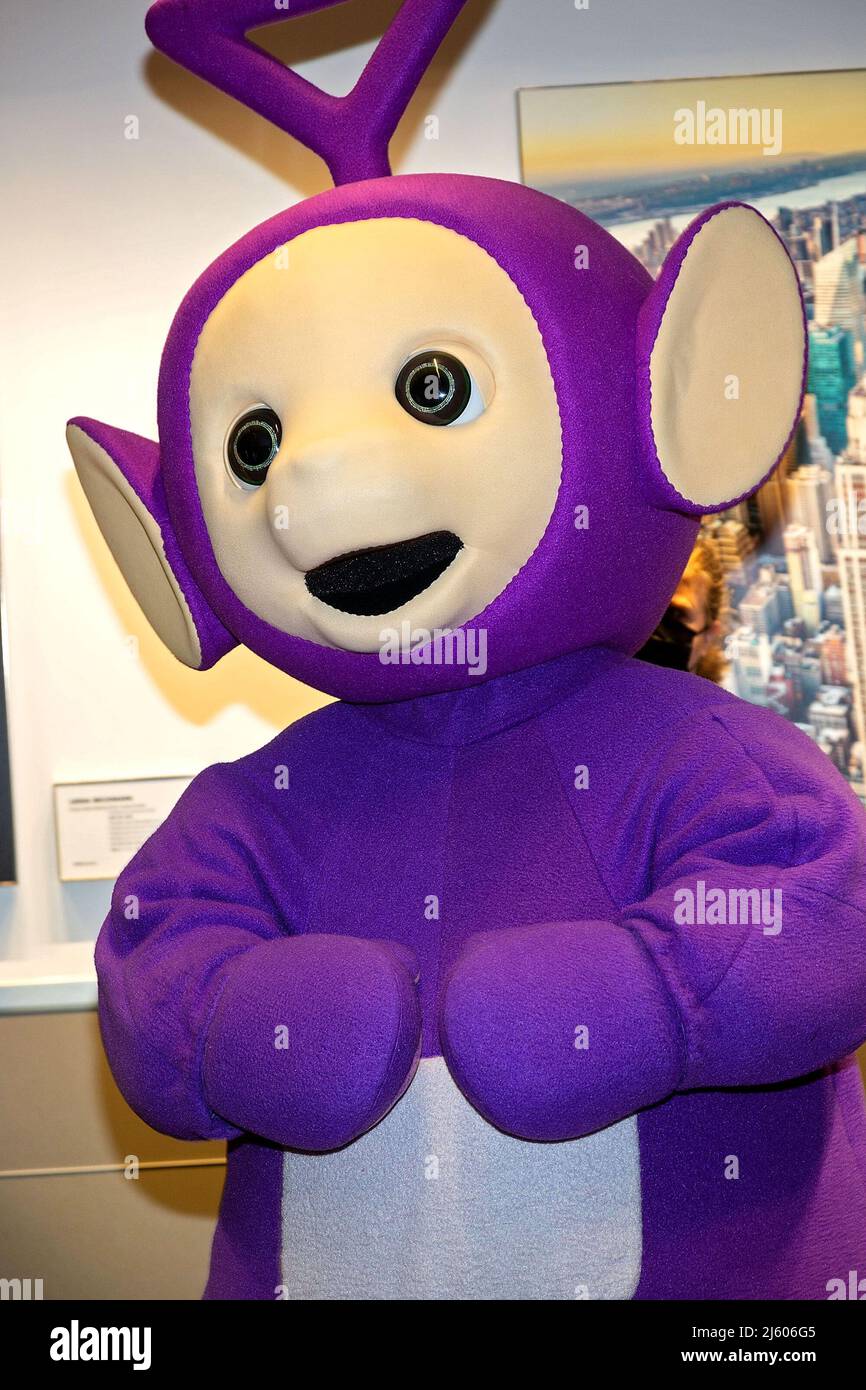 New York, NY, USA. 26th Apr, 2022. Tinky Winky at the Teletubbies ceremonial lighting of the Empire State Building in their iconic colors of purple, green, yellow and red in celebration of their 25th Anniversary year at The Empire State Building. Credit: Steve Mack/Alamy Live News Stock Photo